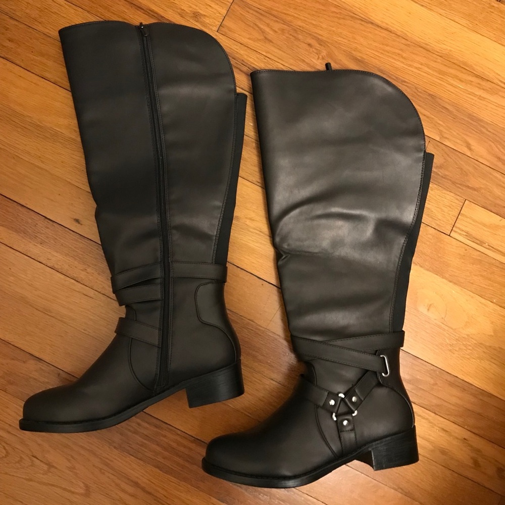 TORRID Over-the-knee boot in black.